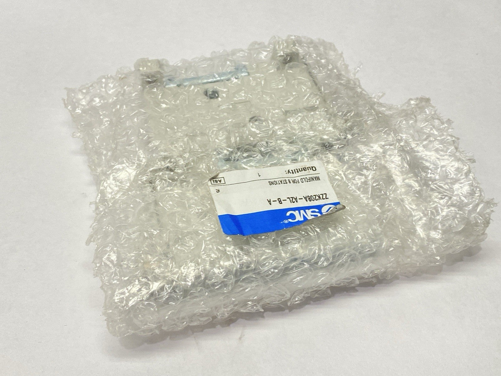 ZZK208A-A2L-B-A | SMC Manifold Side Blocks For 8 Stations - New - Maverick Industrial Sales