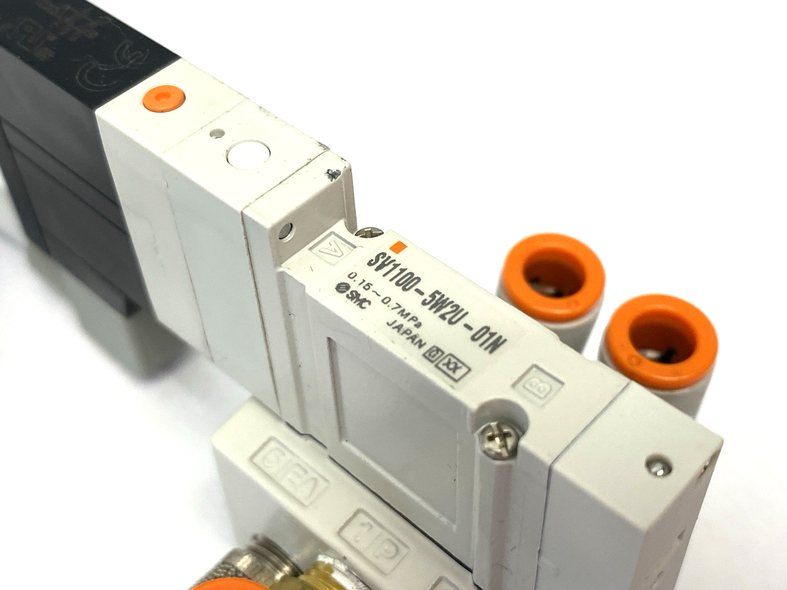 SV1100-5W2U-01N | SMC 5-Port 2-Position Single Solenoid Valve, 1/8" NPT - Used - Maverick Industrial Sales