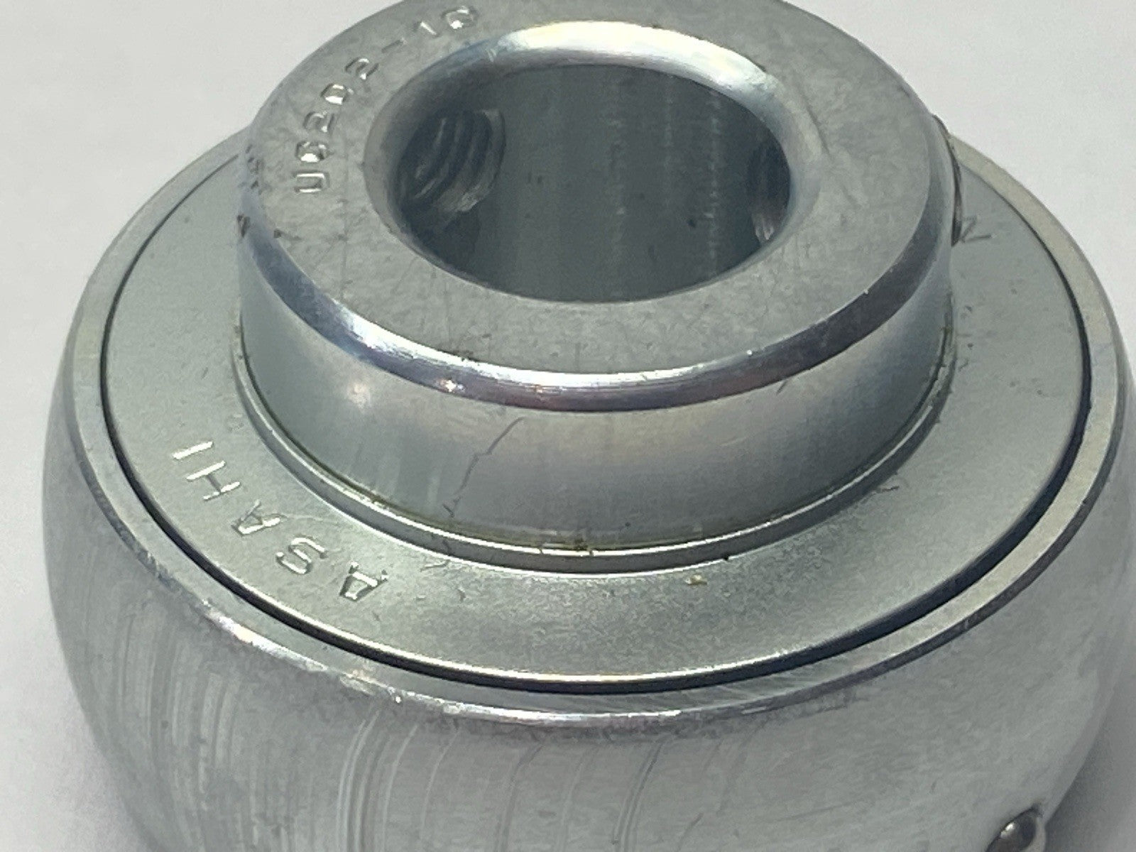 Asahi UC202-10 Ball Bearing Insert - Maverick Industrial Sales