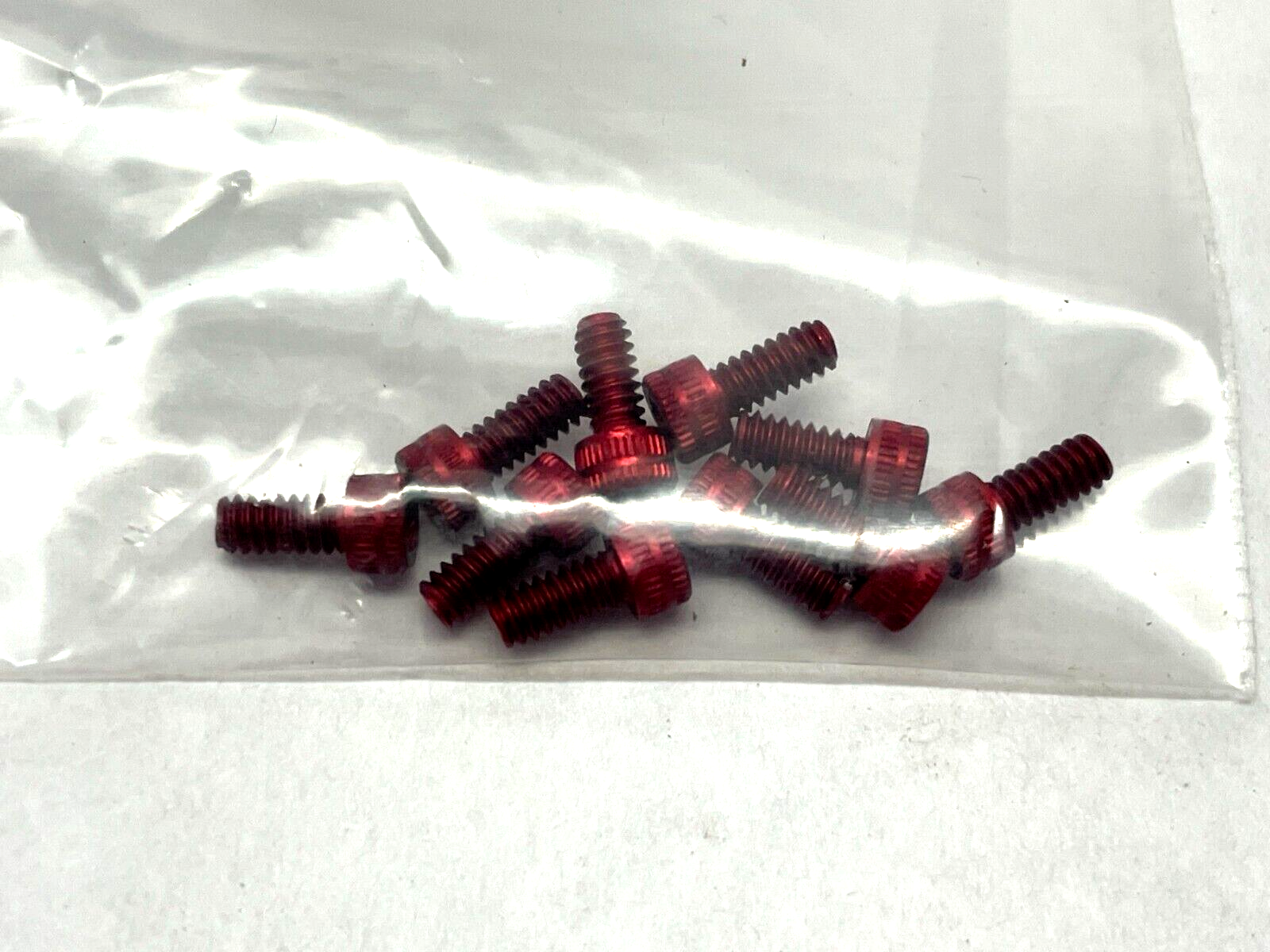 RASC0812-8A4 4-40 x 1/4 SHCS Red Screws PKG OF 10 - Maverick Industrial Sales