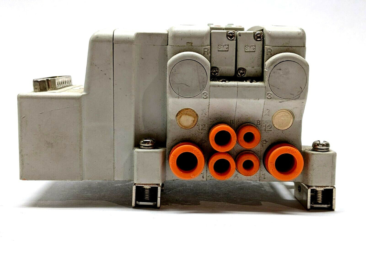 VV5QC11-02C4FD0-DNS | SMC Plug-In Base DIN Rail Mount w/ 2) VQC1300N-5 - Used - Maverick Industrial Sales