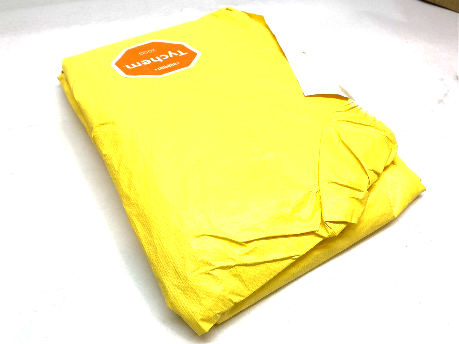 QC127SYLXL001200 | DuPont Tychem 2000 Coverall XL Yellow Attached Hood PKG OF 12 - New - Maverick Industrial Sales