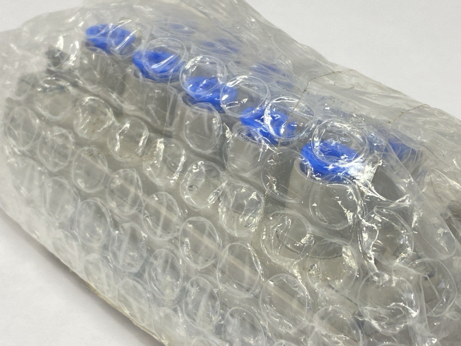 KDM10-06 | SMC Multiconnector Pneumatic Manifold 6mm 10-Port - New - Maverick Industrial Sales