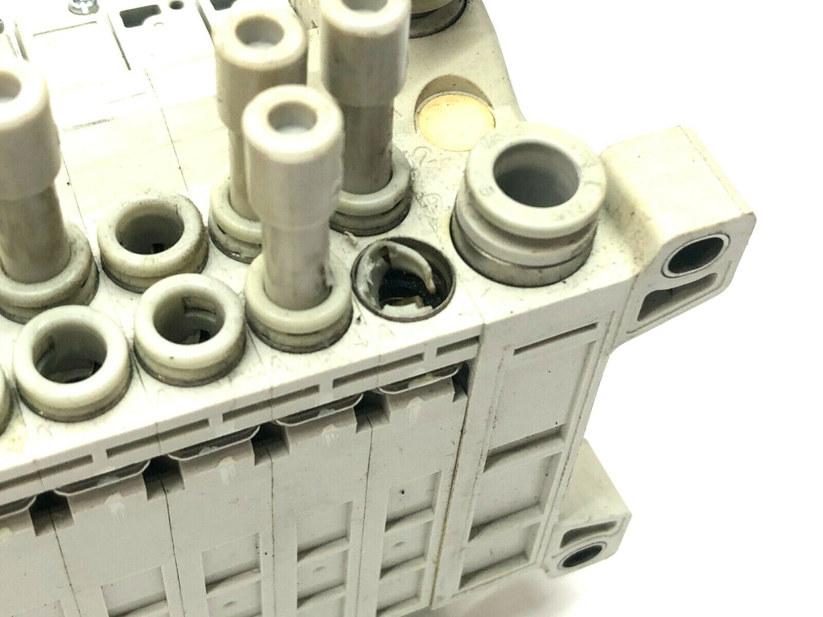 VV5QC11-08C6FD0 | SMC Manifold Base w/ Solenoids - For parts or not working - Maverick Industrial Sales
