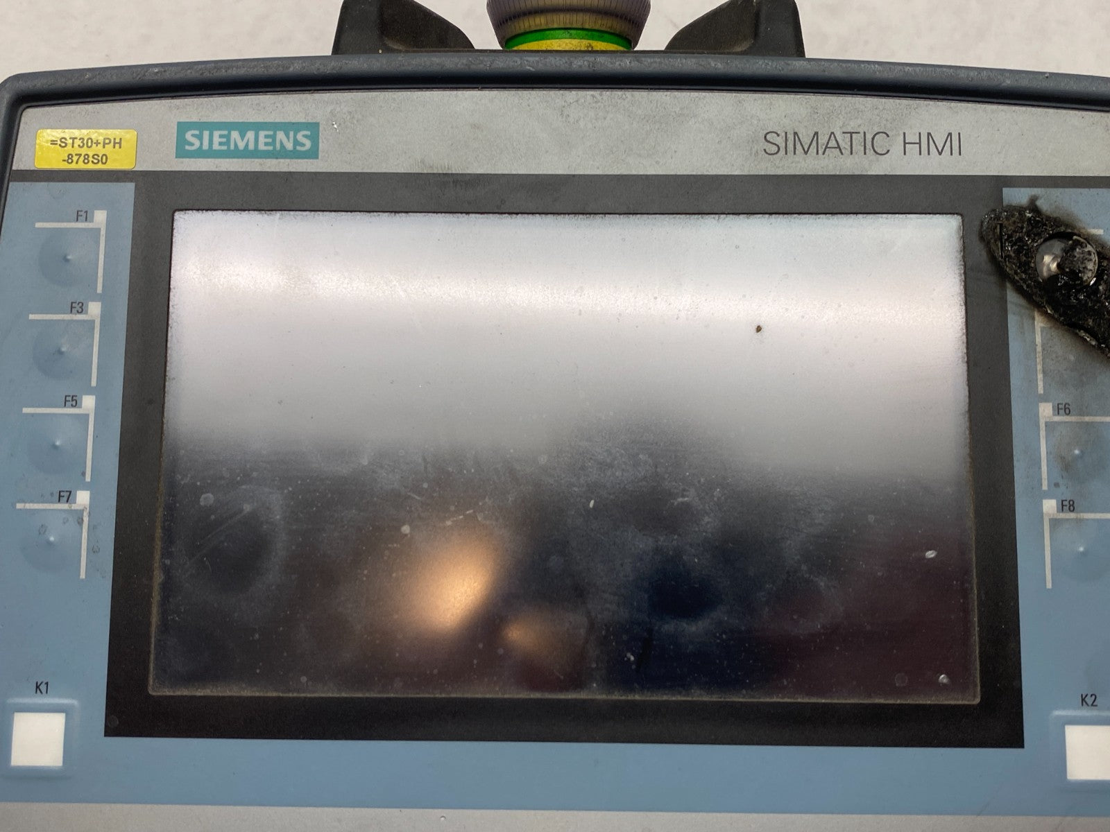 6AV2125-2GB23-0AX0 | Siemens SIMATIC HMI KTP700F Mobile BURN HOLE THROUGH BUTTON - Used - Maverick Industrial Sales