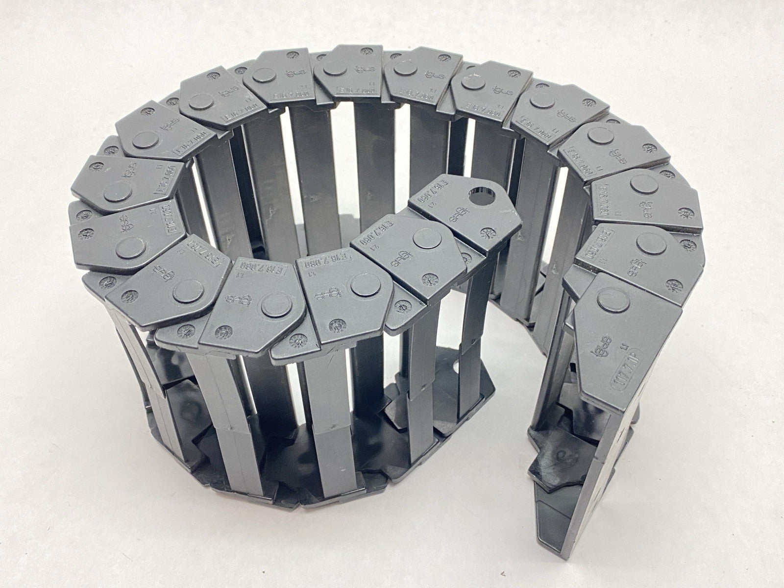 E16.7.060 | Igus E-Chain Assembly 17-Links 1.7ft Length w/ 117.7.P End Bracket - Used - Maverick Industrial Sales
