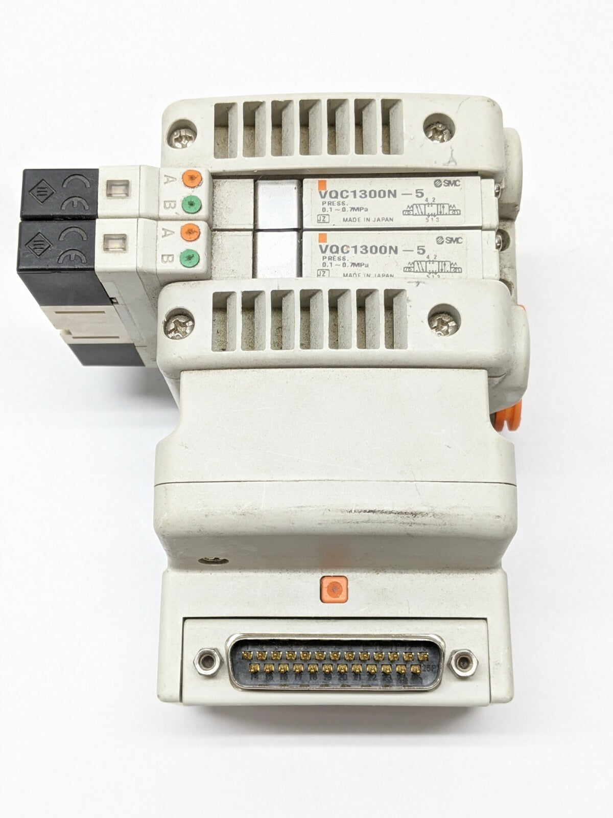 VV5QC11-02C4FD0-DNS | SMC Plug-In Base DIN Rail Mount w/ 2) VQC1300N-5 - Used - Maverick Industrial Sales