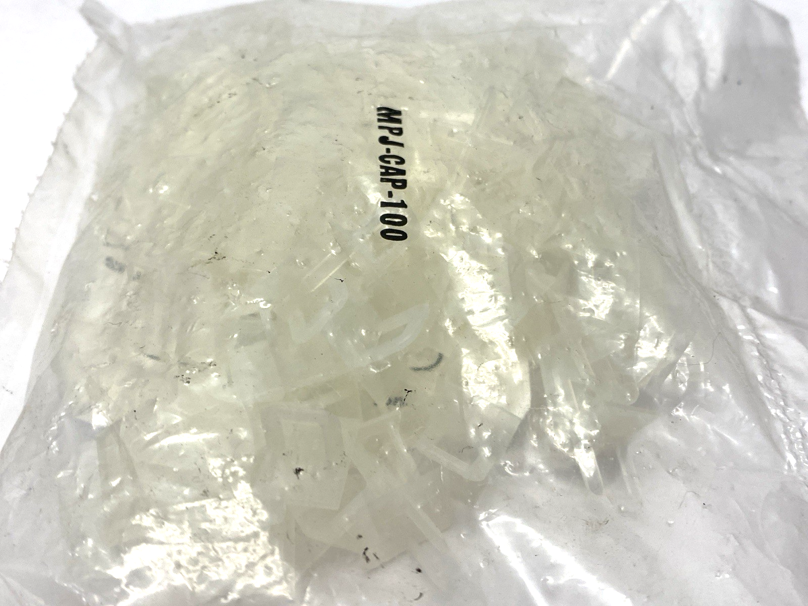 MPJ-CAP-100 | Omega Jack Panel Dust Caps PACKAGE OF 100 - New - Maverick Industrial Sales