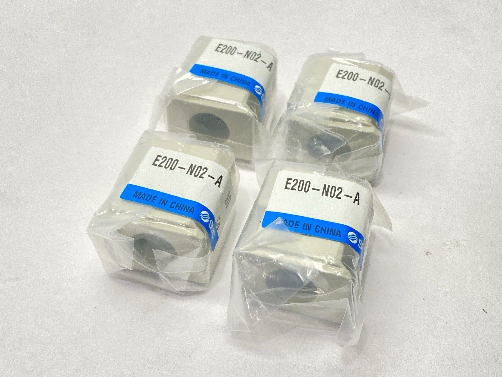 E200-N02-A | SMC Piping Adapter LOT OF 4 - New – Open box - Maverick Industrial Sales