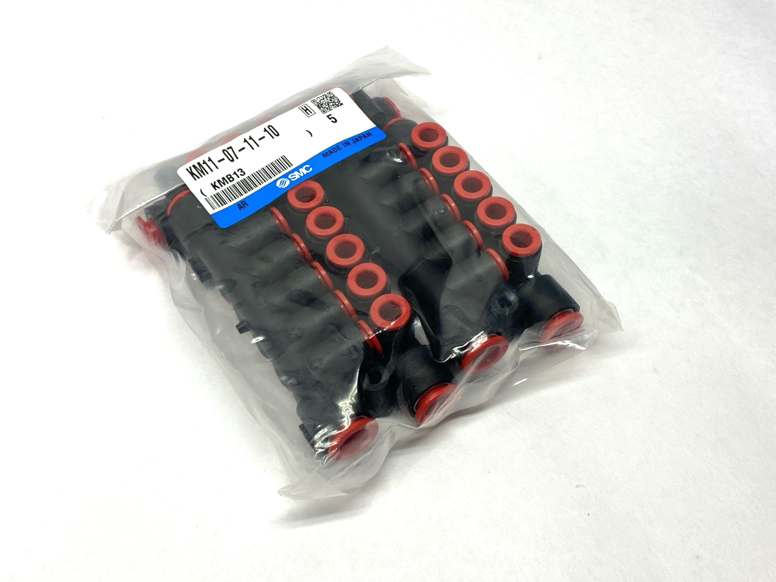 KM11-07-11-10 | SMC Pneumatic Fitting Manifold 10-Ports 1/4" Ports PACKAGE OF 5 - New - Maverick Industrial Sales