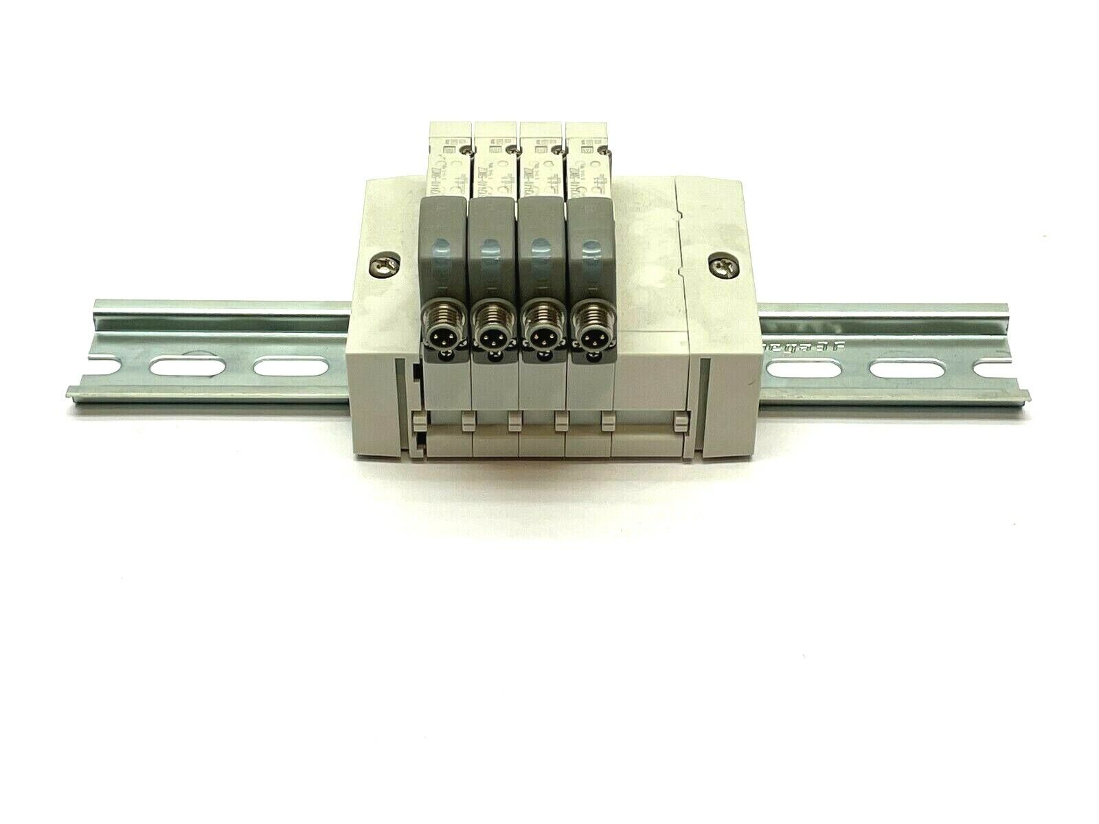 SMC SS5Y3-45-04D-N7 Stacking Manifold w/ SY3140-5WOZ Solenoids - Maverick Industrial Sales