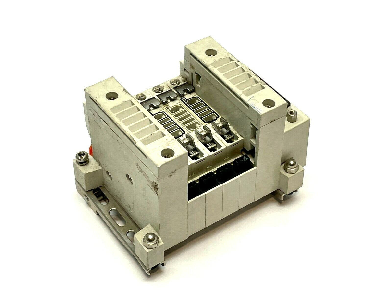 VV5Q11-04N3FU0-D0S | SMC Plug In Base Mounted Manifold - For parts or not working - Maverick Industrial Sales