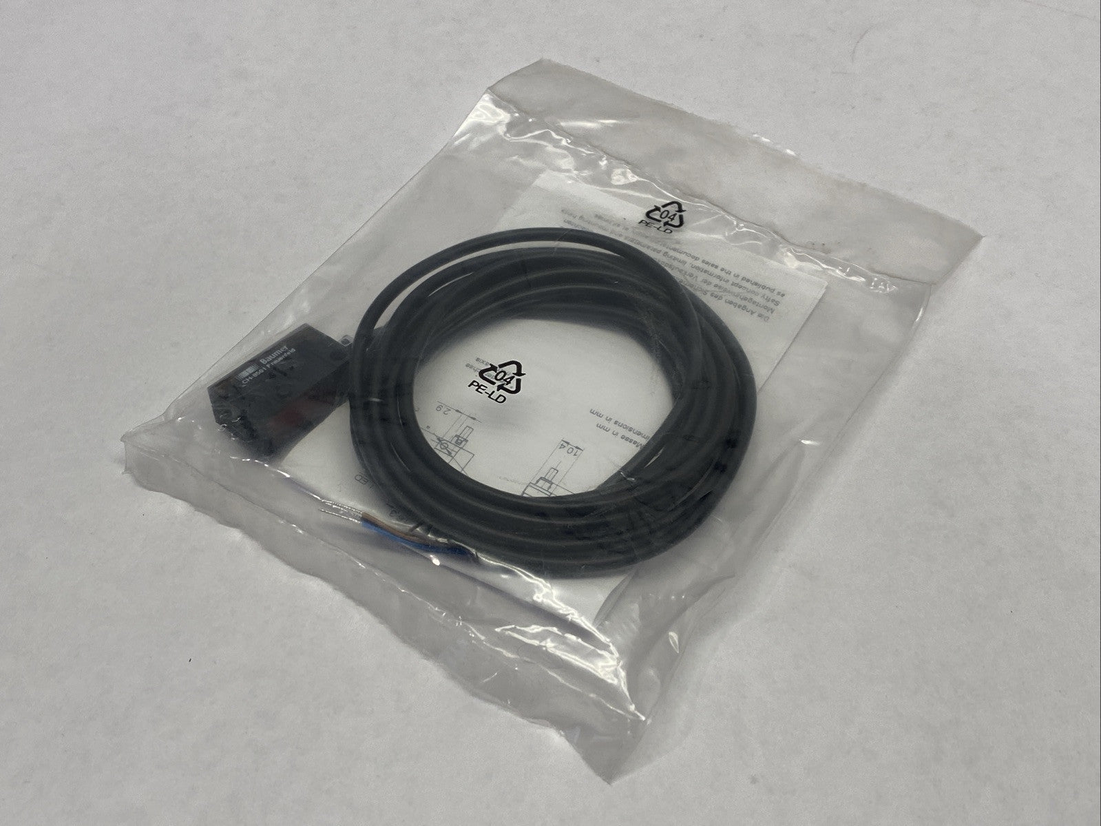 Baumer FPDK 10N5130 Retro-Reflective Sensor 2m 4-pin - Maverick Industrial Sales