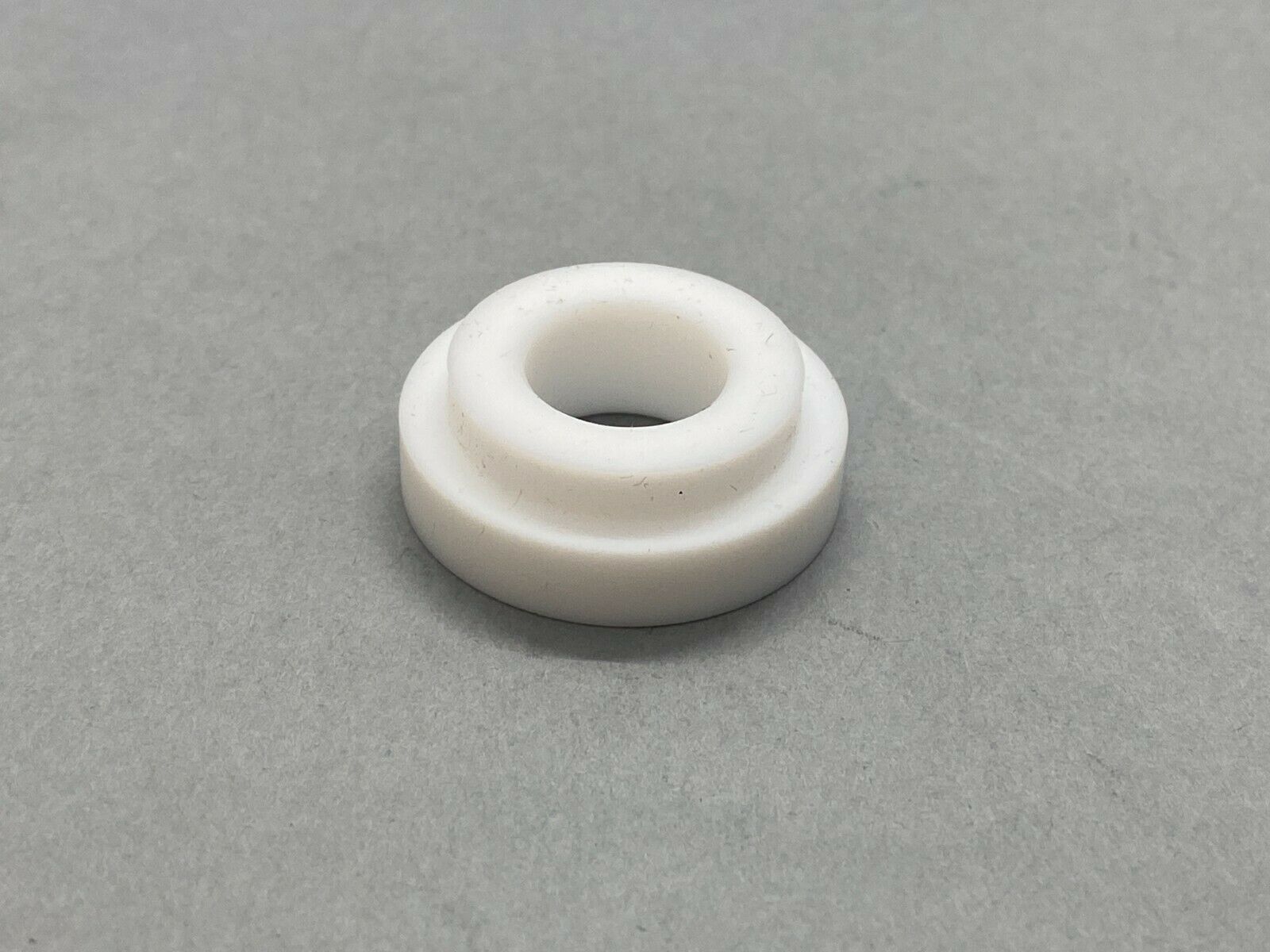 Wilden 01-1140-55 Top Valve Seat for T1 Ultrapure III Pump - Maverick Industrial Sales